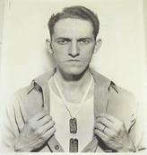 Proper Wear of WW2 Tag, courtesy of US Army Quartermaster Museum